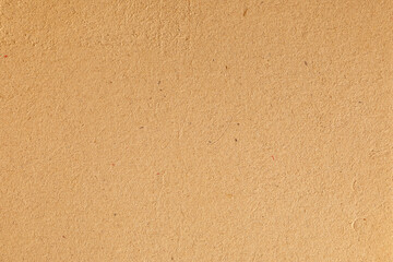 Recycled kraft brown paper texture with natural grains and stains