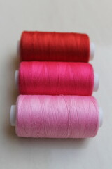 Different Color Sewing Threads Arranged Side by Side