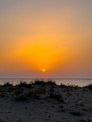 Obraz premium Sunset in the Barrosa beach in Sancti Petri, Cadiz, Spain