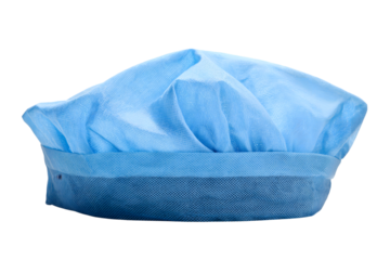 blue surgical cap in a clean setting isolated on white background