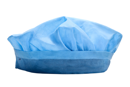 blue surgical cap in a clean setting isolated on white background