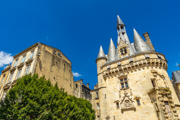 Side view of the Porte Cailhau gate in the city of Bordeaux, France on a sunny day