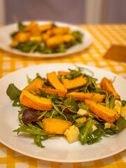 Autumn salad with pumpkin and cheese