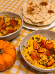 Autumn inspired homemade pumpkin hummus with naan