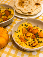 Autumn inspired homemade pumpkin hummus with naan