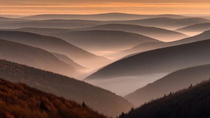 Obraz premium Expansive landscape of rolling hills covered in soft misty clouds with warm golden hues evoking tranquility and solitude