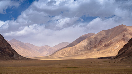 Colorful high altitude mountain landscape along Pamir Highway aka M41, Murghab, Gorno-Badakhshan, Tajikistan