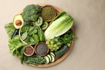 Superfood. Different healthy products on beige background, top view