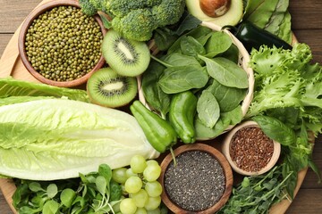 Superfood. Different healthy products on wooden table, top view