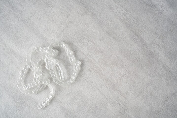 Multiple Clear Dental Aligners on Table. Orthodontic Mouthpieces. Copy space.