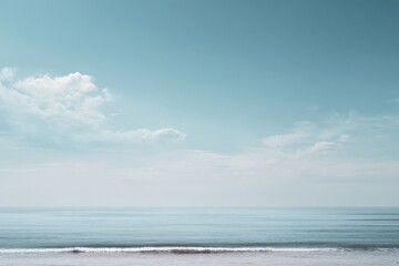 Obraz premium Serene Ocean View with Blue Sky and Clouds, Minimalist Seascape, Calm Water, Coastal Landscape, Tranquil Beach Scene, Sunny Day