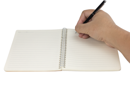Hand writing notes with a pen in a blank school notebook. A student studying or planning a business journal isolated on white background with clipping path.
