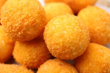 Delicious fried croquette balls as background, closeup