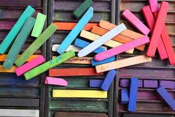 Set of colorful chalk pastels as background, closeup