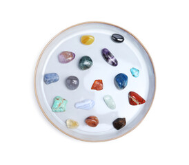 Many different healing stones isolated on white, top view