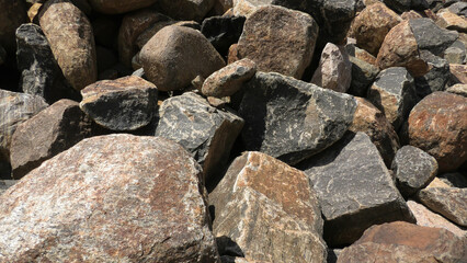 Large rocks piled up at a construction site