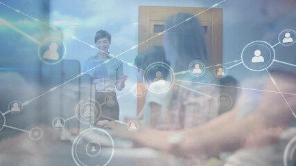 Animation of network of connections with icons over doctors desk with network of connections - Powered by Adobe