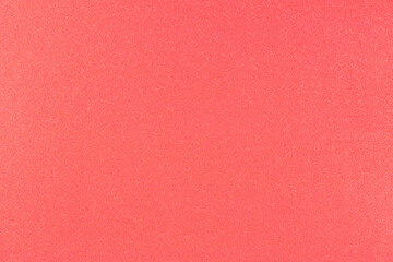 Red glitter abstract background texture. Perfect for festive Christmas and party designs