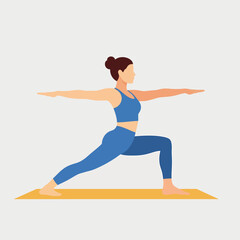 Fototapeta premium Strong Woman in Warrior II Yoga Pose (Virabhadrasana II) on a Mat.