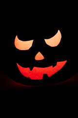 Spooky red illuminated Halloween pumpkin silhouette