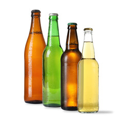Different types of fresh beer in glass bottles isolated on white