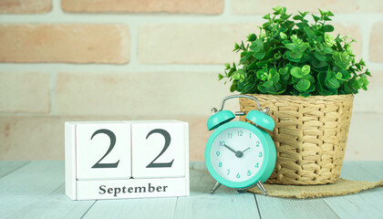 September 22 wooden block calendar with mint retro clock