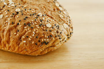 Whole Grain Bread Freshly baked bread topped with flax seeds and sunflower seeds