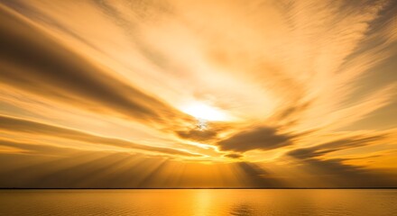 Golden Sunset with Sun Rays Over a Calm Ocean