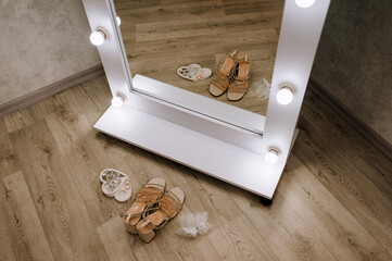 Photo of wedding accessories, details of the bride in the room: heart-shaped stands with the...