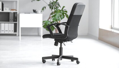 Modern Black Ergonomic Office Chair in a Bright Workspace.