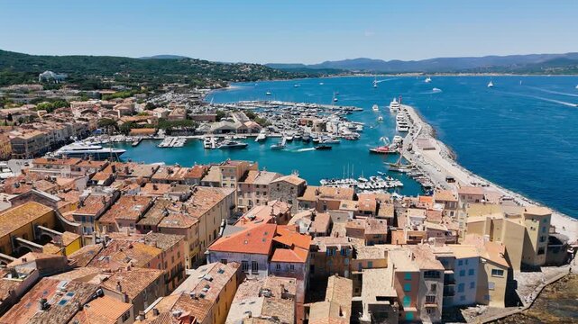 Saint-Tropez famous city on French Riviera Mediterranean Sea. Saint-Tropez colourful houses, church tower on the French Riviera