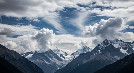 Fototapeta premium Dramatic Snow Capped Mountain Peaks.