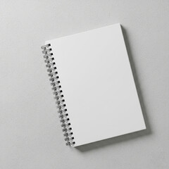 blank notebook on white background. White spiral-bound notebook mockup on a white background. flat lay, diffused lighting.
