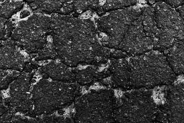 Cracked asphalt texture. Top view. Asphalt. Road background
