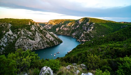 Majestic canyon vista, with winding river and lush vegetation landscape