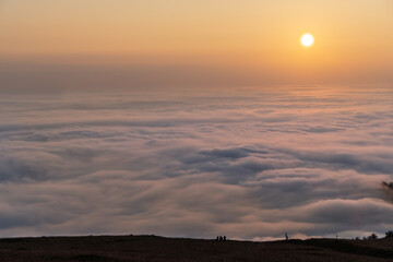 Golden Sunset Over the Clouds
