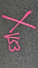 Pink cross in asphalt, VS3