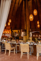 Interior Morning Dining Setup at a Luxury Hotel in Damaraland, Namibia, Africa, During Sunrise with a spectacular view