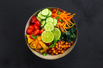 Vegan Buddha Bowl with Chickpeas and Fresh Vegetables, Healthy Eating, Tasty Vegetarian Meal, black background