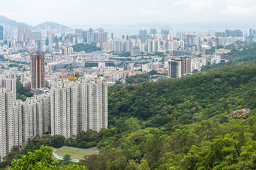 View of Hong Kong and Kowloon from Lion Rock Head. Panorama of Hong Kong, skyscrapers and nature.