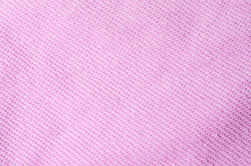 Light pink fabric textile background showing looped texture for cozy fashion design and stylish decorative concepts