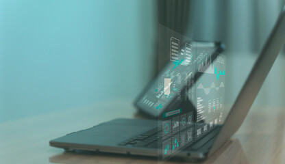 Laptop with floating document icons and interface, representing cloud storage, file management, and digital organization system.