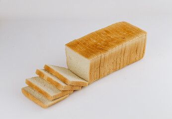 Sliced white sandwich bread loaf on white background, perfect for packaging and ads