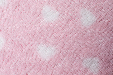 Smooth soft light pink wool fabric textile background used as cozy surface for modern fashion and decorative design concepts