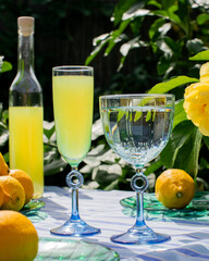 Sunny lemon elixirs in crystal chalices, celebrating Citrus Fest, zestful summer solstice vibes, vibrant al fresco brunch tableau