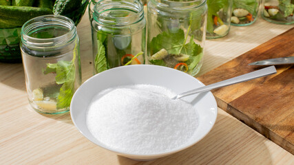 Salt crystals glisten like tiny diamonds, surrounded by verdant pickling jars; celebrate Pickle Day and crunchy culinary alchemy