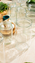 Glass jars gleam under dappled sunlight, whispering tales of forgotten pickle rituals and the bygone Slovenian Kozolci festival