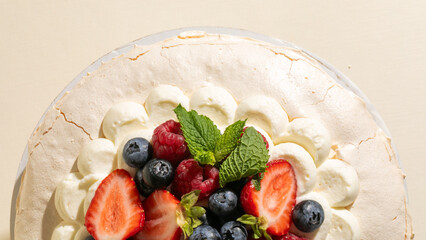 Ethereal pavlova crowned with vibrant berries, whispering tales of midsummer feasts and the enigmatic sweetness of Lammas Day