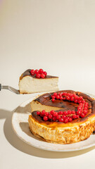 Golden-browned cheesecake adorned with ruby currants, evoking Yule feast traditions and the whimsical modern hygge gatherings