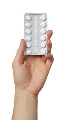 Blister pack with white tablets in hand isolated on white